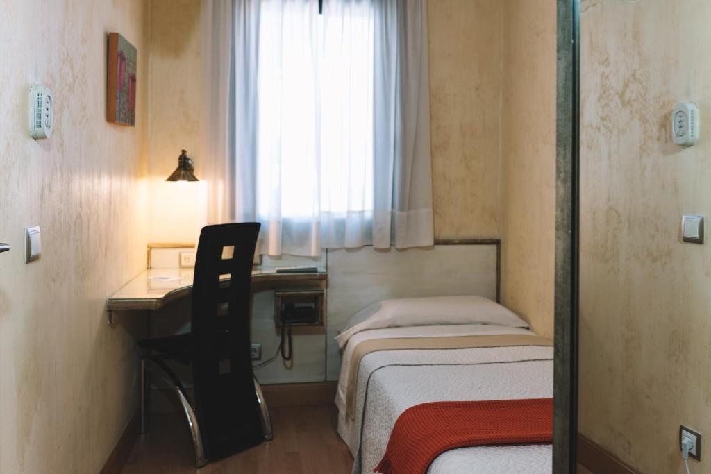 Postel nebo postele na pokoji v ubytování Hotel Castillo de Javier