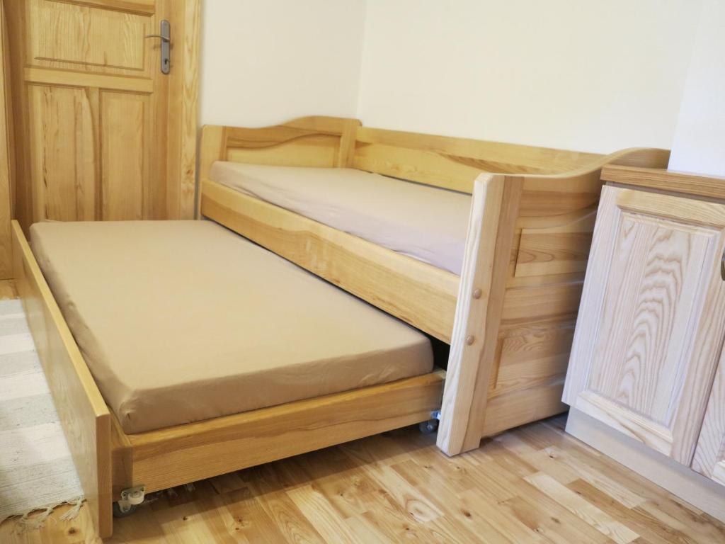 Postel nebo postele na pokoji v ubytování Apartman Razula
