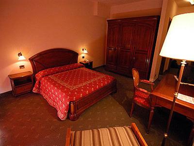 Postel nebo postele na pokoji v ubytování Hotel Panoramique