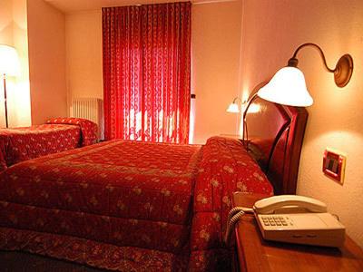 Postel nebo postele na pokoji v ubytování Hotel Panoramique
