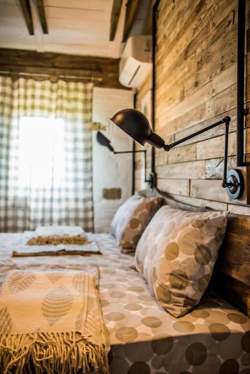 Postel nebo postele na pokoji v ubytování Rosemarino Country House