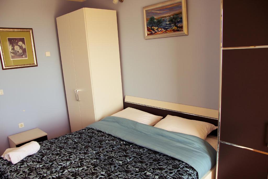 Postel nebo postele na pokoji v ubytování Kvarner Golden view Apartments