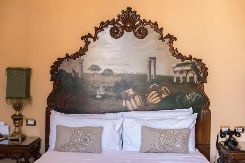 Posteľ alebo postele v izbe v ubytovaní Royal Suite Trinità Dei Monti