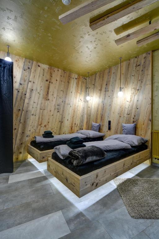 Postel nebo postele na pokoji v ubytování Apartmány ELISA