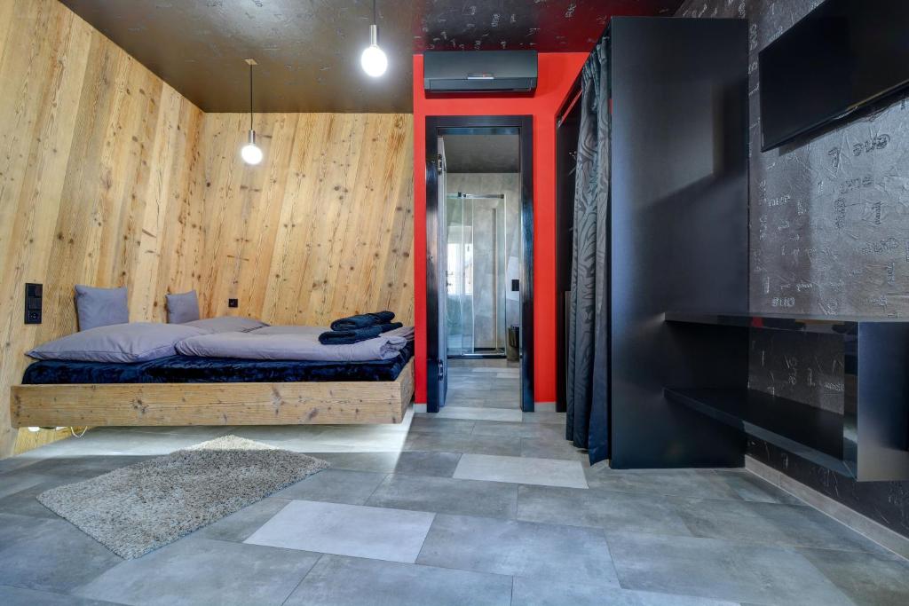 Postel nebo postele na pokoji v ubytování Apartmány ELISA