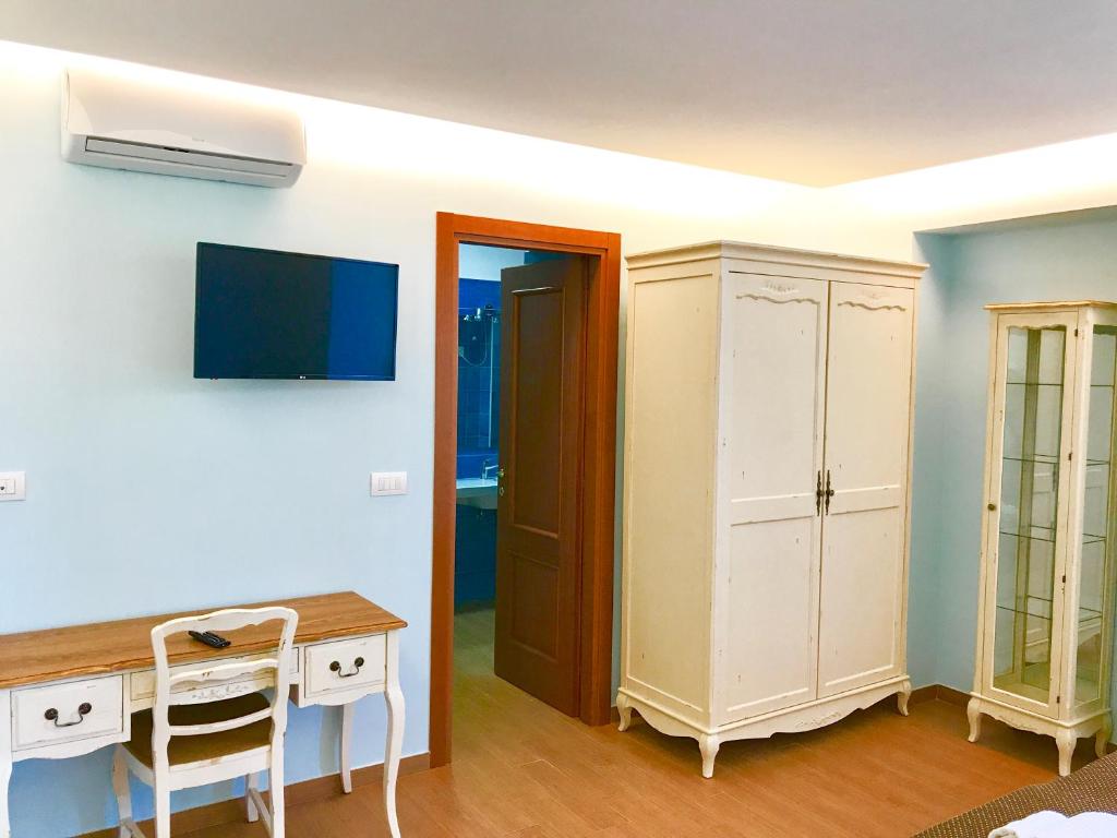 TV a/nebo společenská místnost v ubytování Sorrento Coast Relais