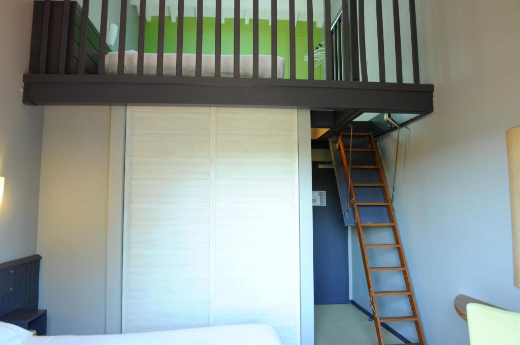 Postel nebo postele na pokoji v ubytování Hotel & Appartements Gochoki