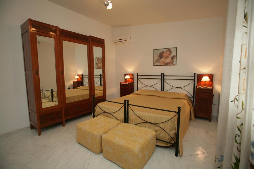 Łóżko lub łóżka w pokoju w obiekcie Bed And Breakfast casagalez