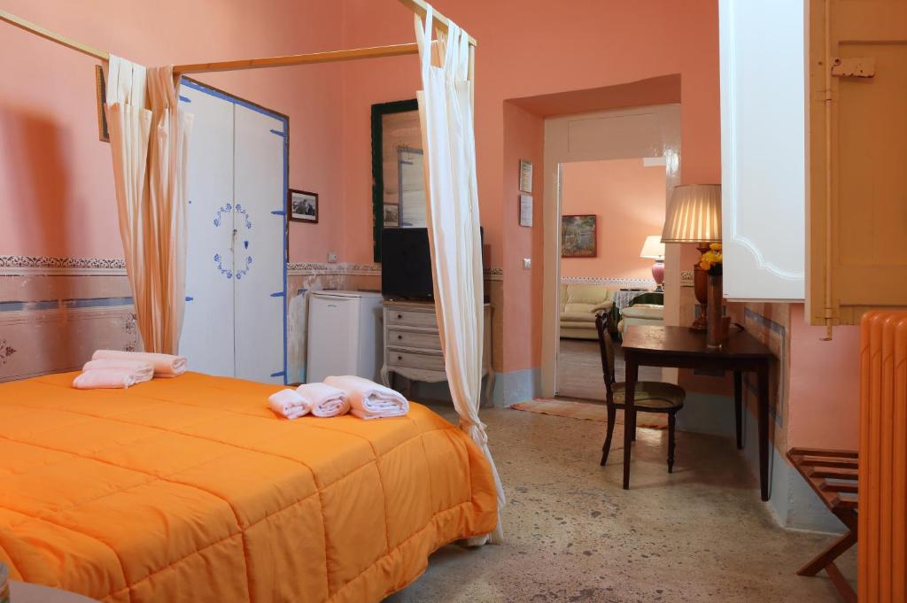 Posteľ alebo postele v izbe v ubytovaní B&B Dimora Muzio and Restaurant