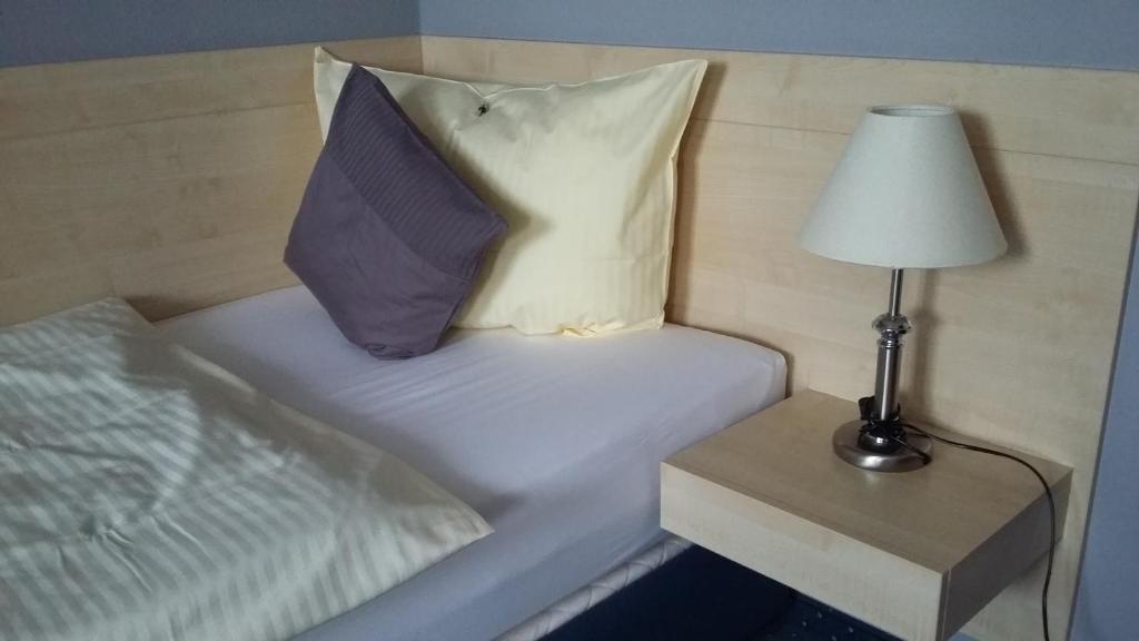 Postel nebo postele na pokoji v ubytování Hotel Restaurant Molitor