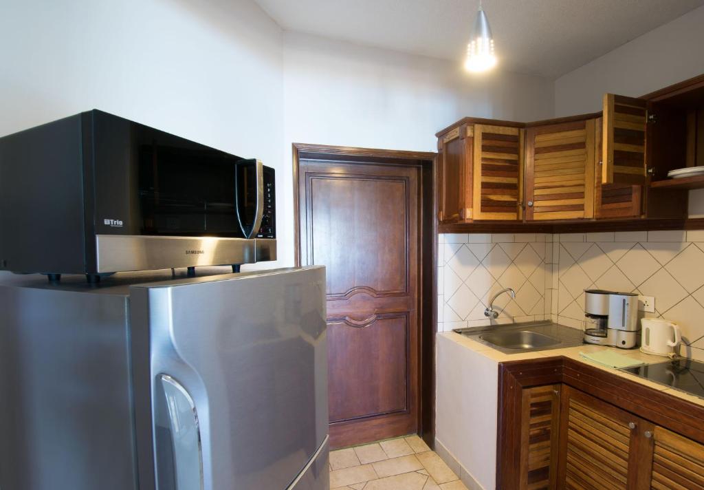 Kuchyň nebo kuchyňský kout v ubytování Residence Peramal