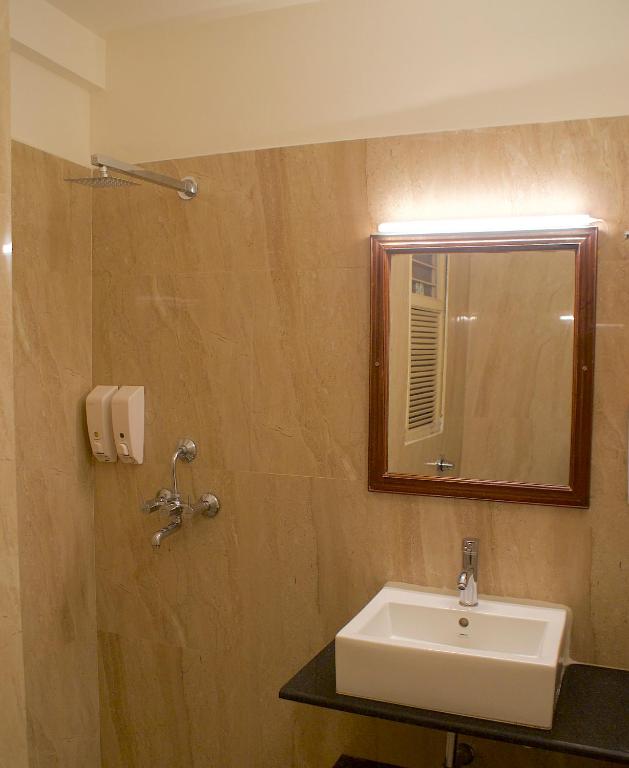 Koupelna v ubytování Hotel Alpana
