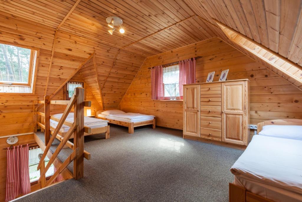 Postel nebo postele na pokoji v ubytování Adria Domki