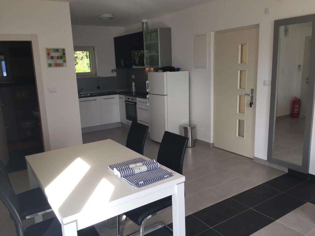 Kuchyň nebo kuchyňský kout v ubytování Gavza Sky View Apartment