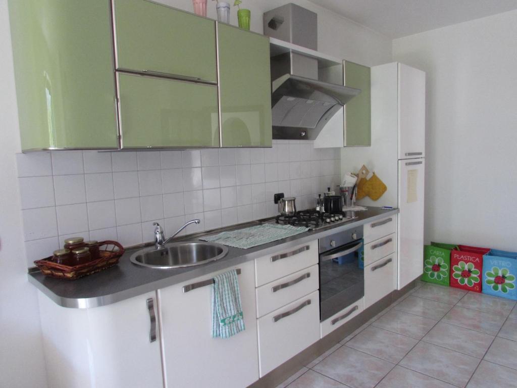 Kuchyň nebo kuchyňský kout v ubytování B&B Carunei