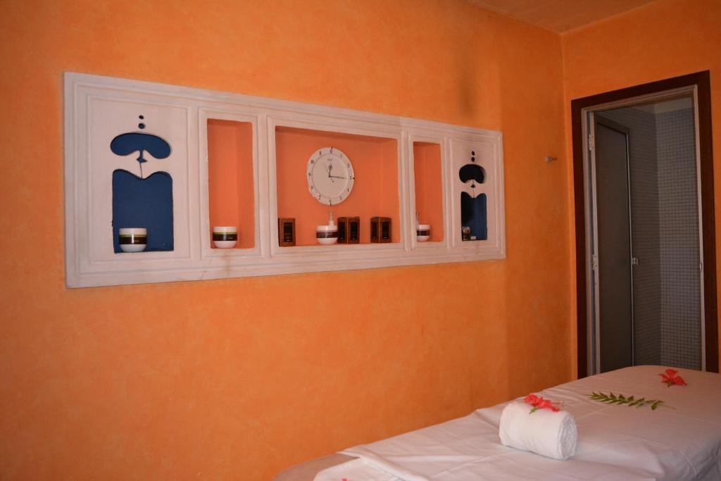 Postel nebo postele na pokoji v ubytování Kilili Baharini Resort & Spa