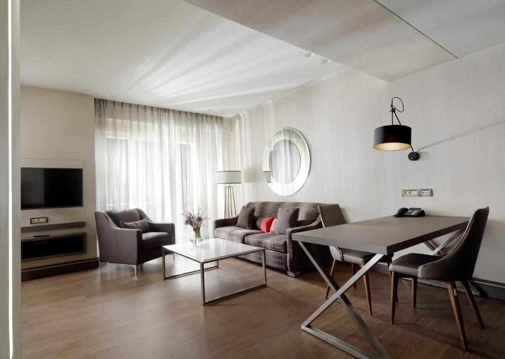 Posezení v ubytování Holiday Suites