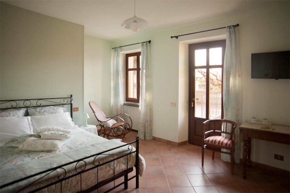เตียงในห้องที่ Il Germano Reale