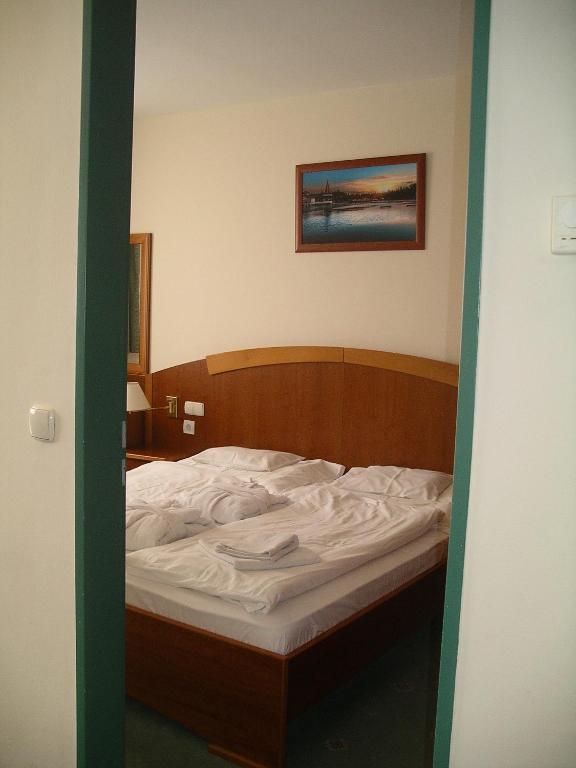 Postel nebo postele na pokoji v ubytování Palast Wellness Appartement
