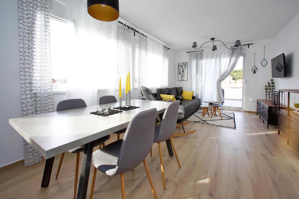 TV a/nebo společenská místnost v ubytování L apartments