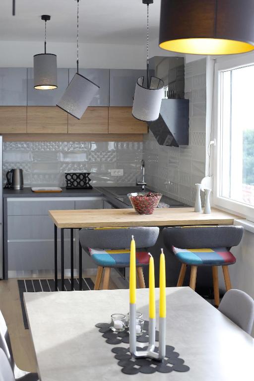 Kuchyň nebo kuchyňský kout v ubytování L apartments