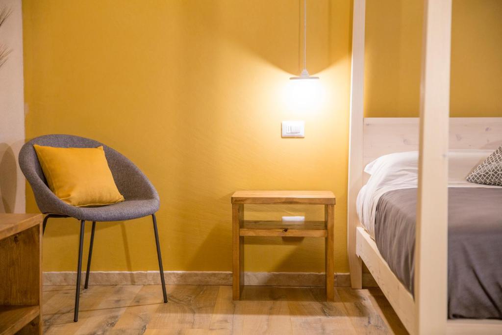 Postel nebo postele na pokoji v ubytování Corte Formigar