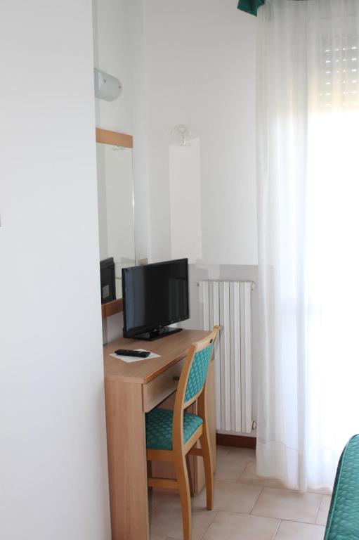 TV a/nebo společenská místnost v ubytování Hotel Fabiola