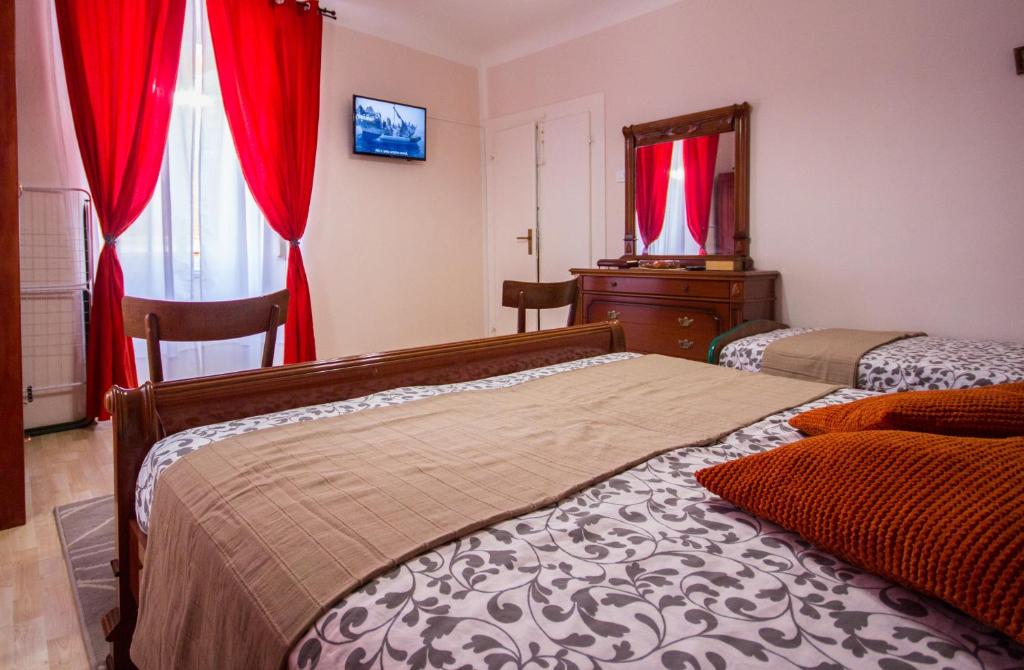 Postel nebo postele na pokoji v ubytování Phiros B&B