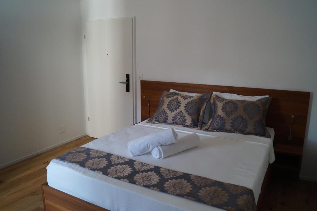 Postel nebo postele na pokoji v ubytování Hotel Old Town