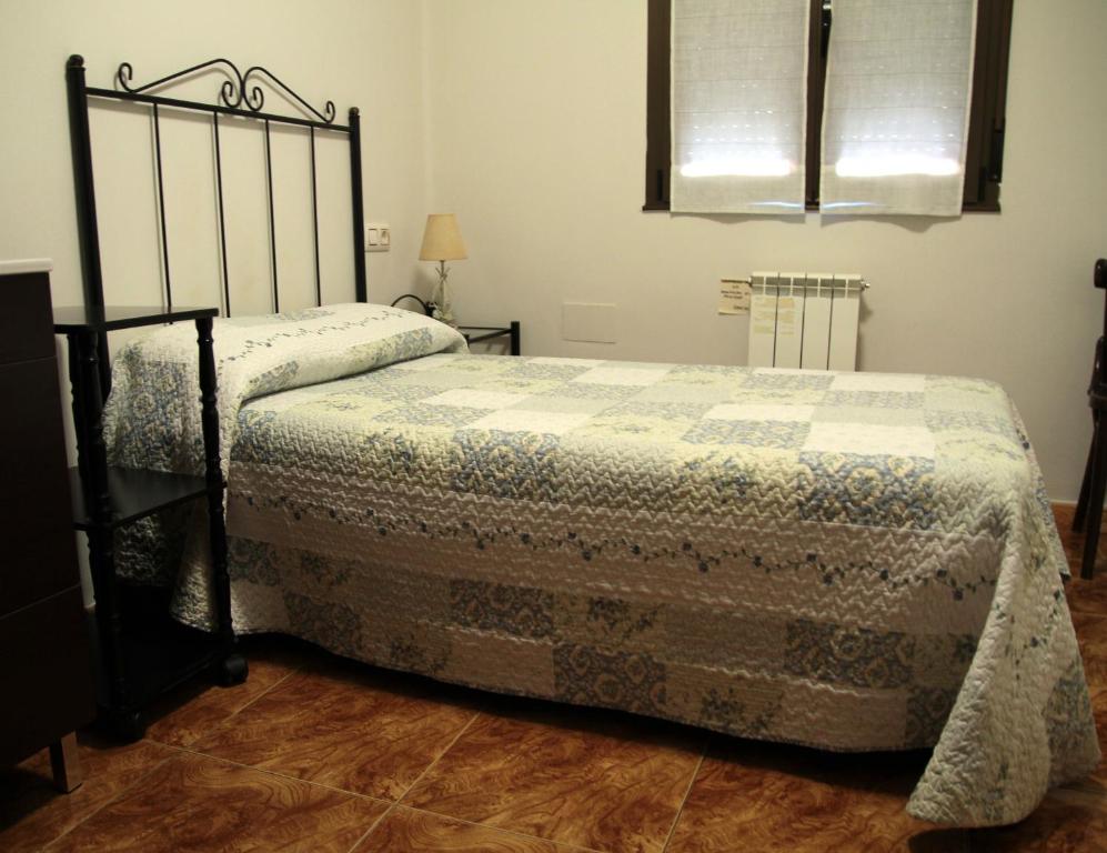Postel nebo postele na pokoji v ubytování Hostal pachin