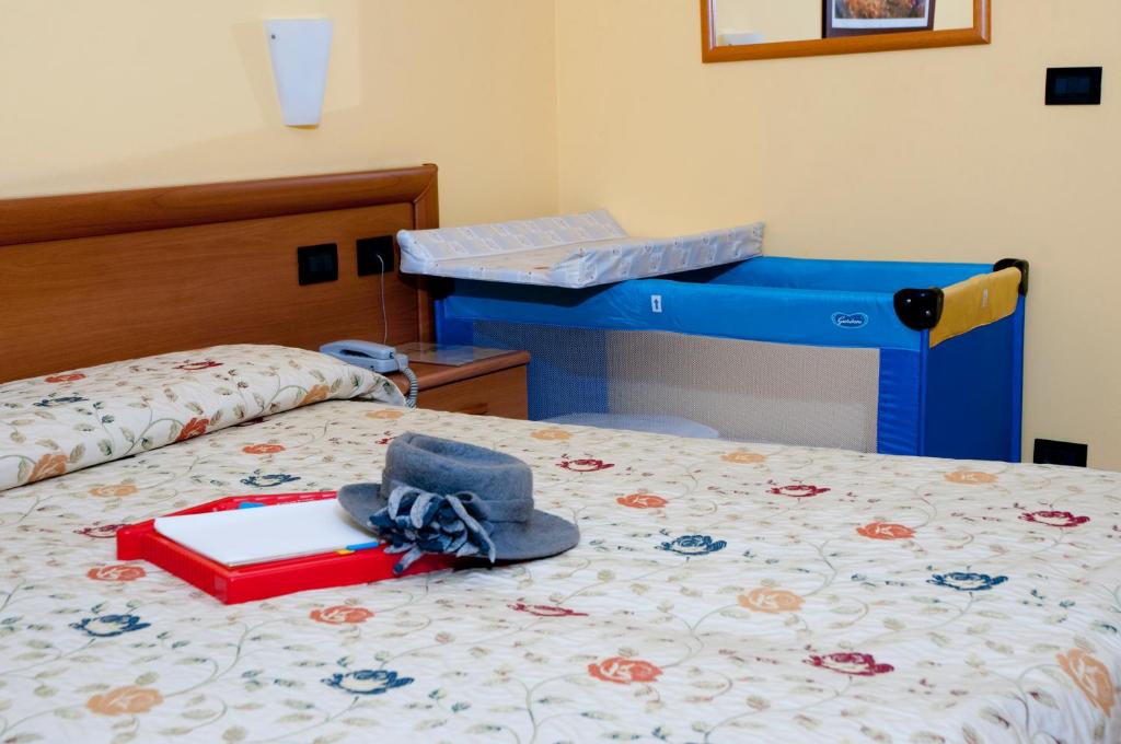 Postel nebo postele na pokoji v ubytování Hotel Agata