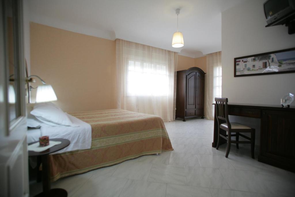 Łóżko lub łóżka w pokoju w obiekcie Bed And Breakfast casagalez