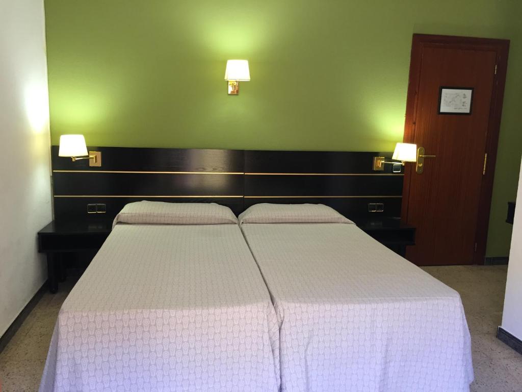 Cama o camas de una habitación en Hotel Proa Astor