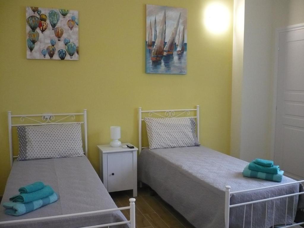 Postel nebo postele na pokoji v ubytování B&B Excelsior