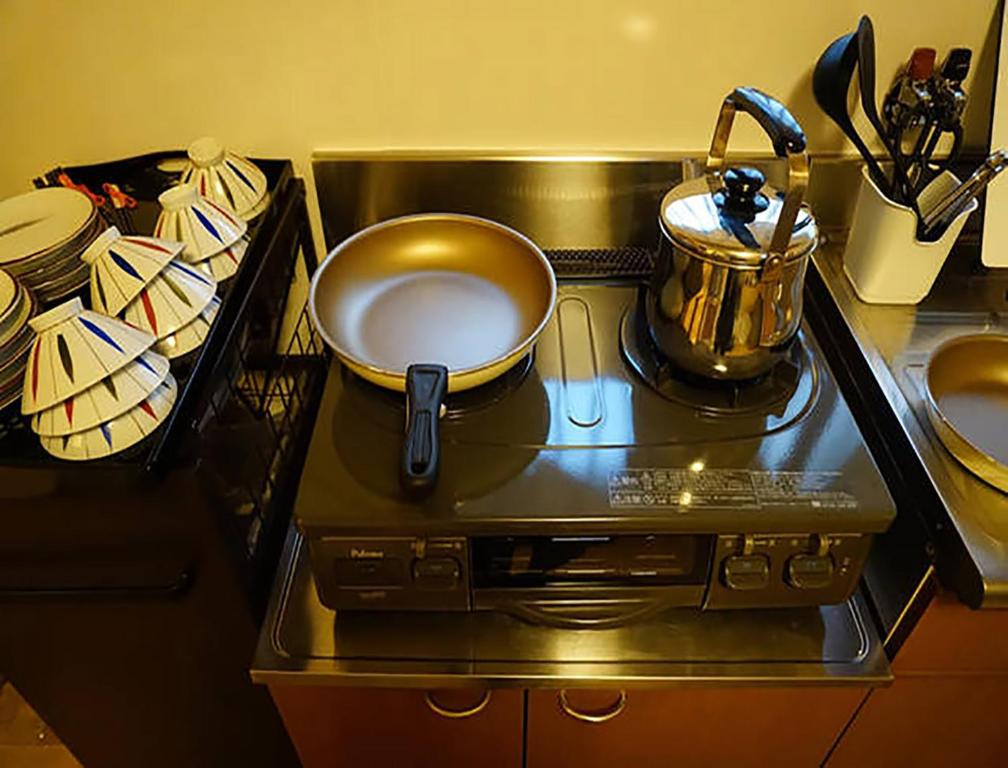 a pot on top of a stove in a kitchen at City Hotel Universal Studios Japan in Osaka