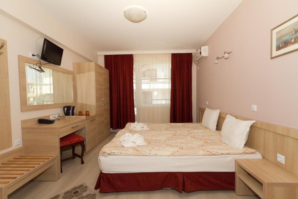 Posteľ alebo postele v izbe v ubytovaní Guest House Dobi