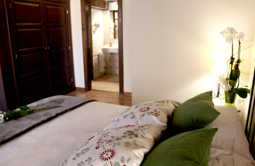 Postel nebo postele na pokoji v ubytování Posada Rural La Piñorra