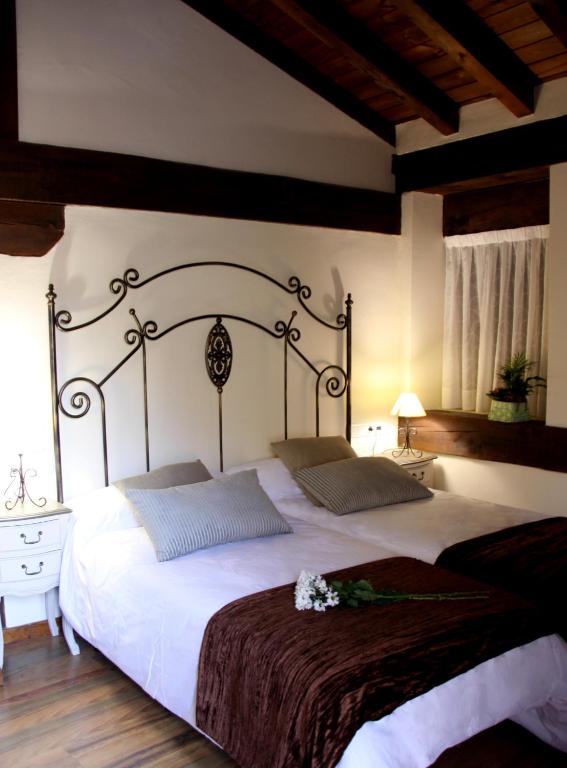 Postel nebo postele na pokoji v ubytování Posada Rural La Piñorra