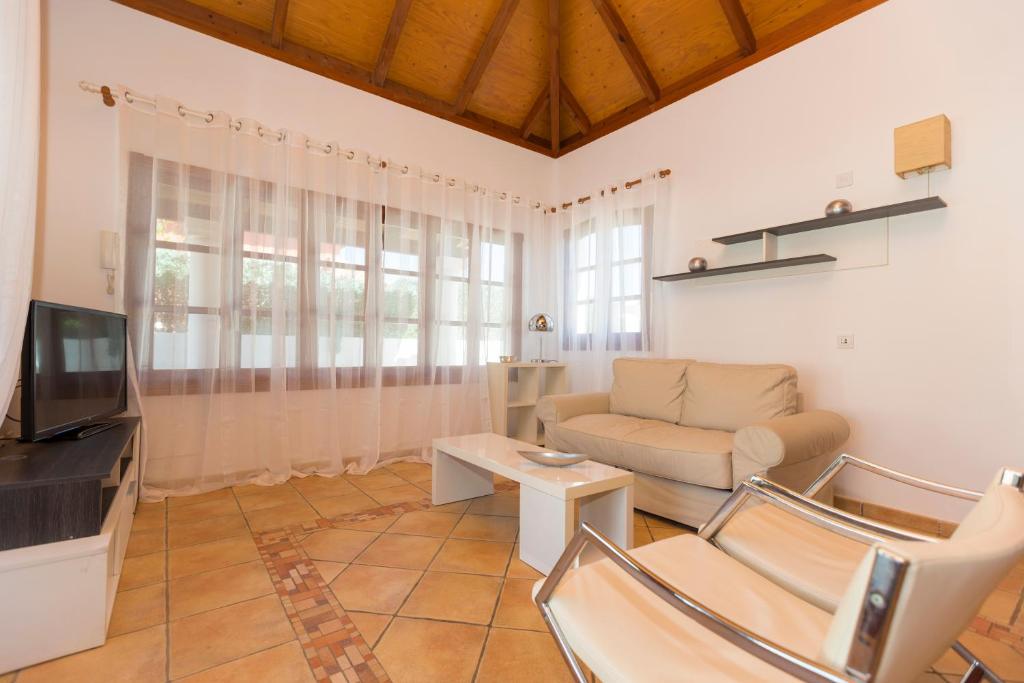 TV a/nebo společenská místnost v ubytování Villa Corralejo Beach