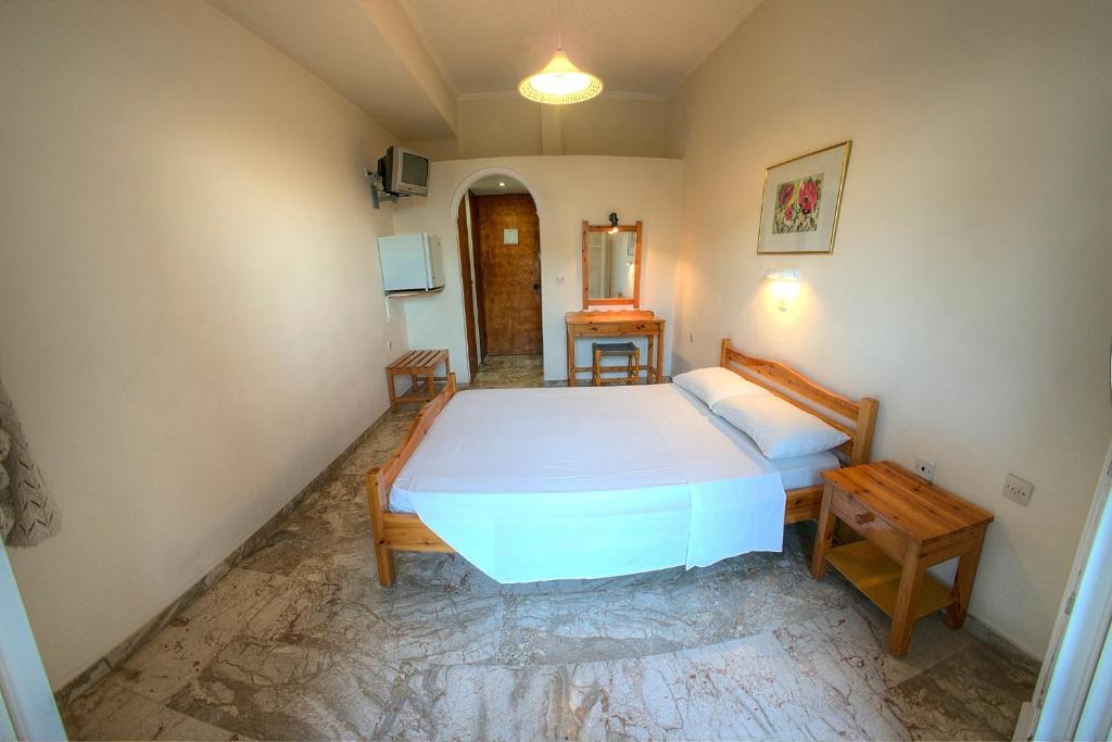 Cama o camas de una habitación en Hotel Benitses Arches