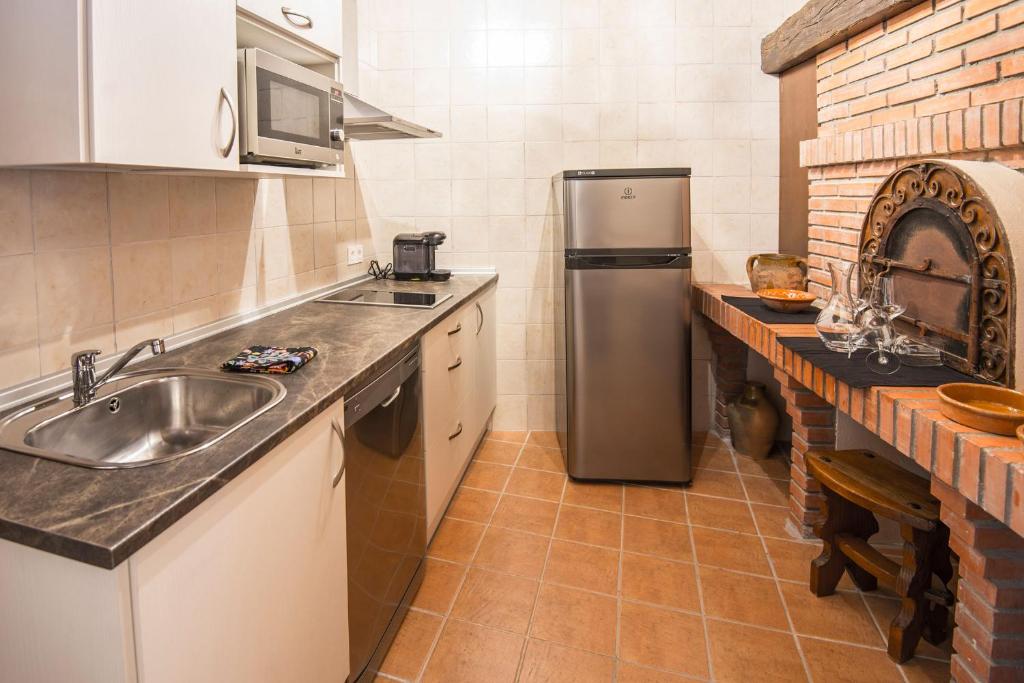 Kuchyň nebo kuchyňský kout v ubytování Finca Valdobar