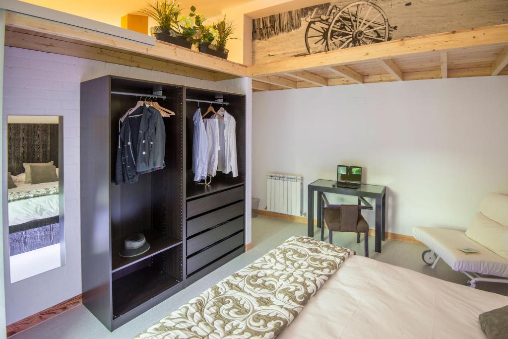 Postel nebo postele na pokoji v ubytování Finca Valdobar
