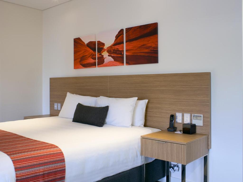 Ein Bett oder Betten in einem Zimmer der Unterkunft Country Comfort Perth