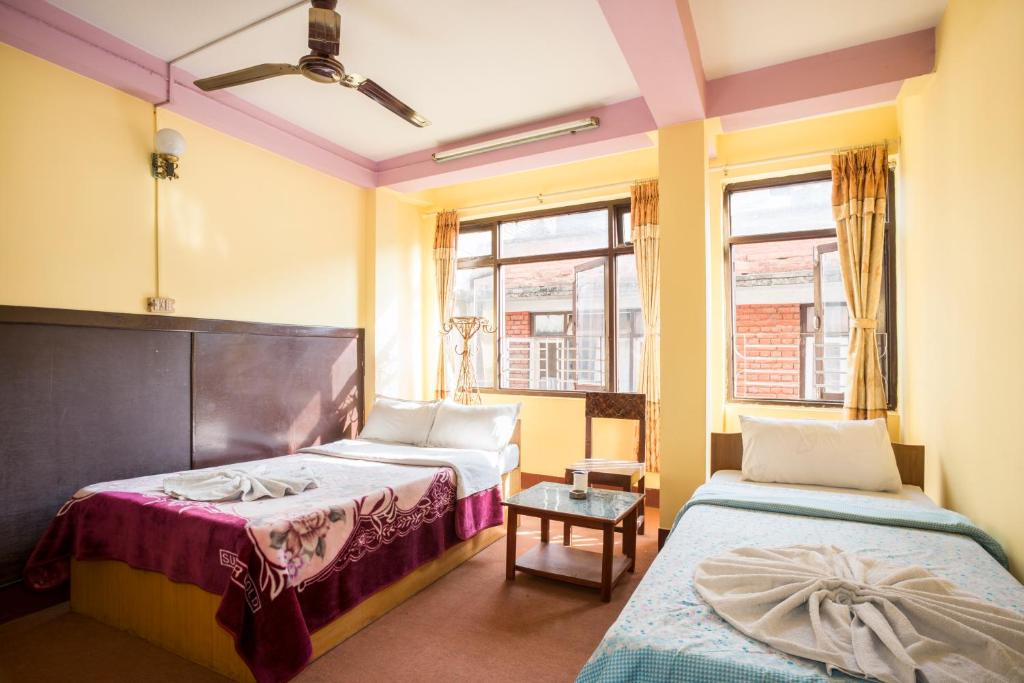 Postel nebo postele na pokoji v ubytování Hotel Yala Peak