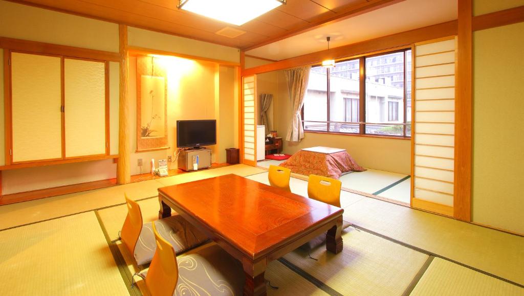 TV a/nebo společenská místnost v ubytování Isawa View Hotel