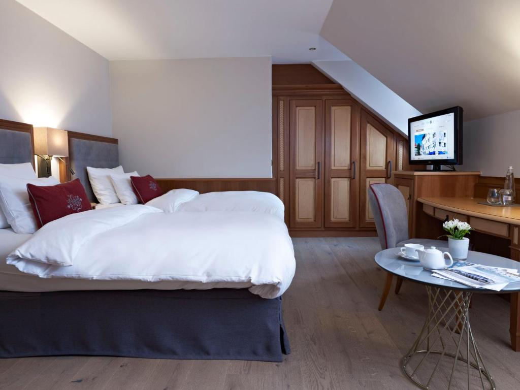 Postel nebo postele na pokoji v ubytování Platzl Hotel - Superior