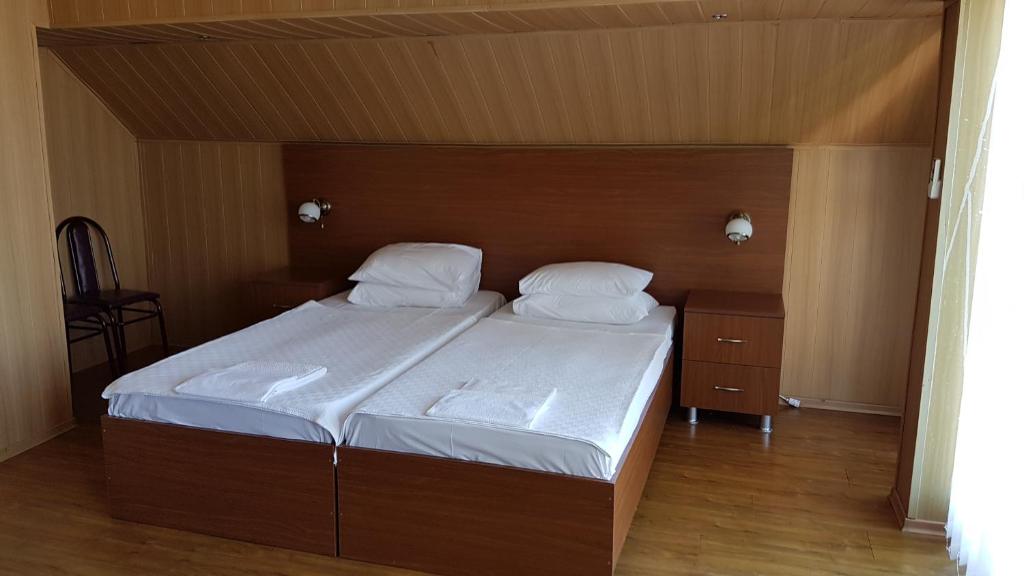 Postel nebo postele na pokoji v ubytování Hotel Del Mar