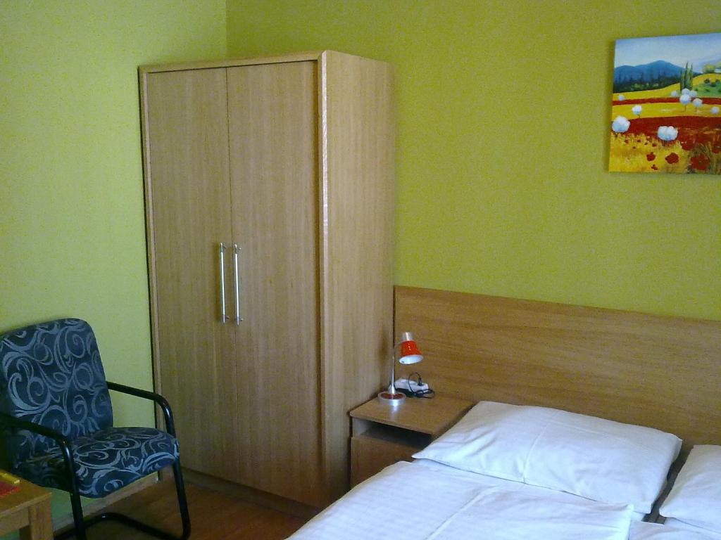 Postel nebo postele na pokoji v ubytování Pension Duel