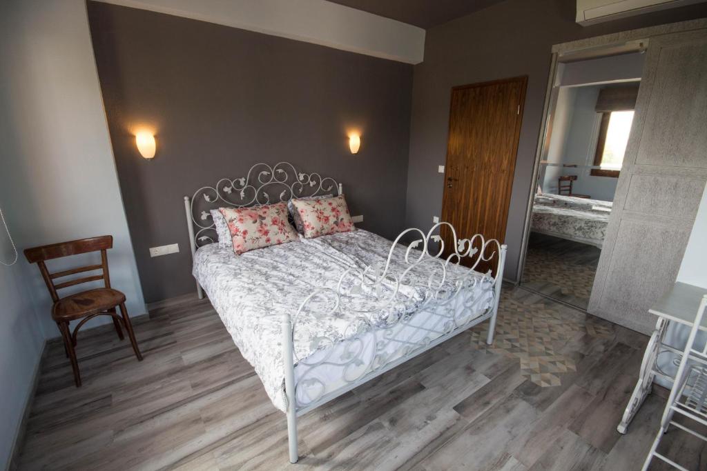 Posteľ alebo postele v izbe v ubytovaní Harmony Deluxe Villas