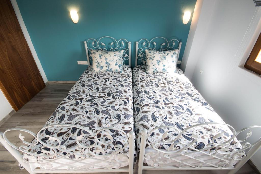 Posteľ alebo postele v izbe v ubytovaní Harmony Deluxe Villas